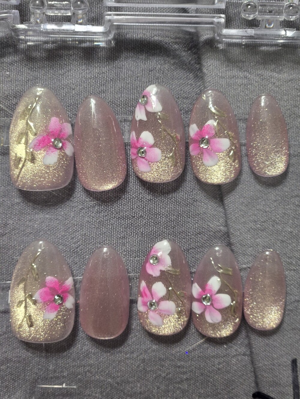 Pink Floral Press-On Nail Set with Gold Glitter Accents, Almonds short Length
